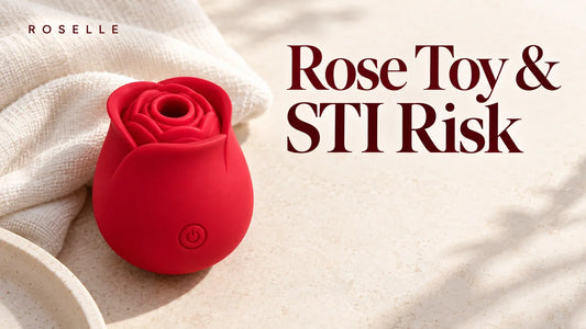 Red rose-shaped device beside an ivory cloth on a warm stone surface, with the title Rose Toy & STI Risk.