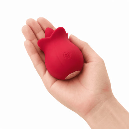 Roselle Kiss Tongue Vibrator held in hand for size reference